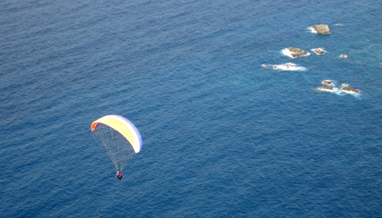 adventurous holiday, extreme sports, flying paragliders in winter