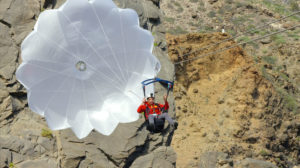 A pilot throws his reserve chute